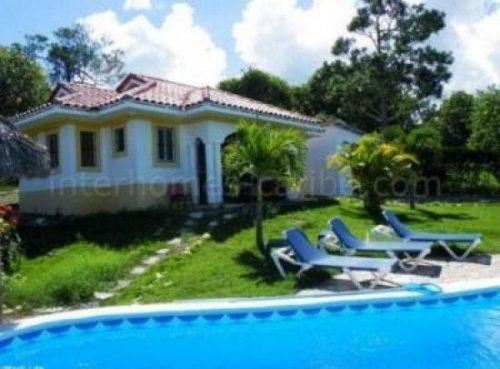 Sosúa/Dominikanische Republik Immobilienportal Sosua: Villa in renommierter Wohnanlage mit 100 m² (1 076 sqft) Wohnfläche auf 1014 m² (10 911 sqft) Grundstück, zwei zwei 