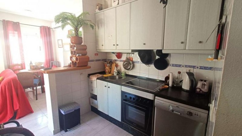 Orihuela Costa Sehr schönes Endreihenhaus mit 2 Schlafzimmern, 2 Bädern, Gästebereich im Souterrain, Dachterrasse und Gemeinschaftspool Haus