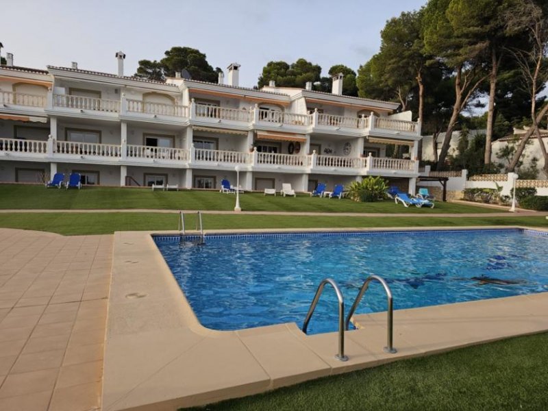Moraira Maisonette-Wohnung mit 2 Schlafzimmern, 1 Bad, 2 Tiefgaragenstellplätzen, Gemeinschaftspool und Meerblick Wohnung kaufen