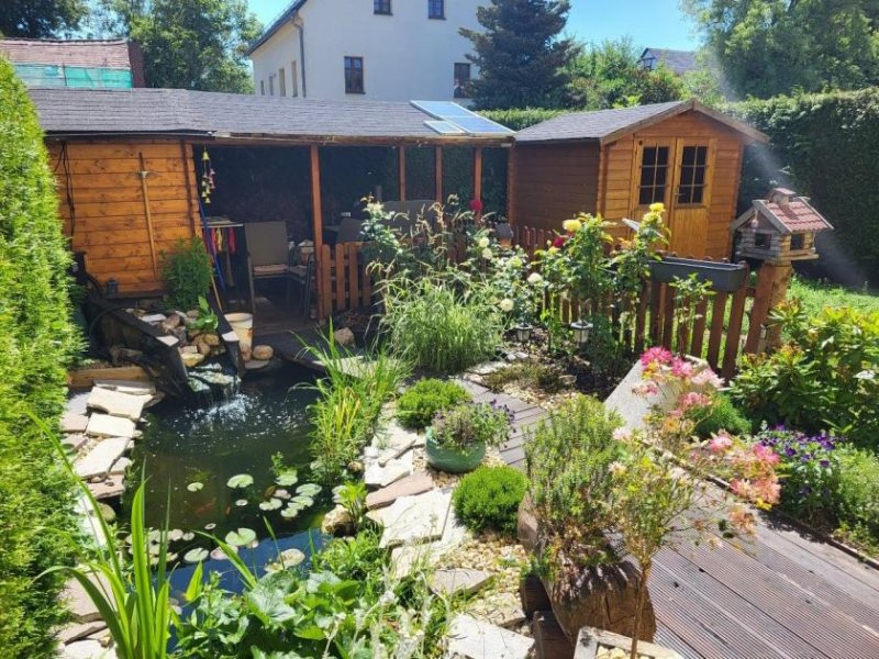 Zwickau Voll vermietetes Mehrfamilienhaus mit 4 WE´s, gepflegtem Garten und Stellplätzen in Zwickau! Haus kaufen