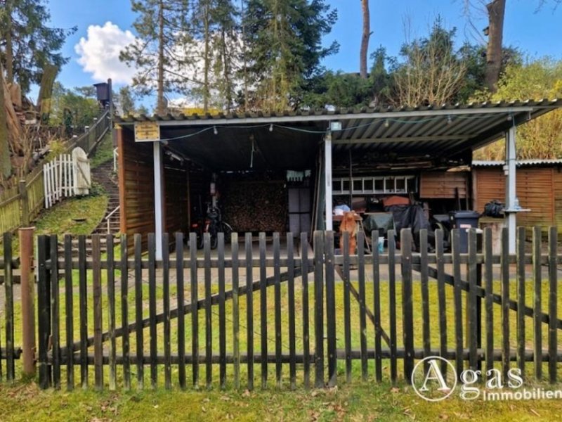 Groß Lindow Erholung pur: Freizeitbungalow mit Holzblockhaus in Bungalowsiedlung und Kanalblick Haus kaufen
