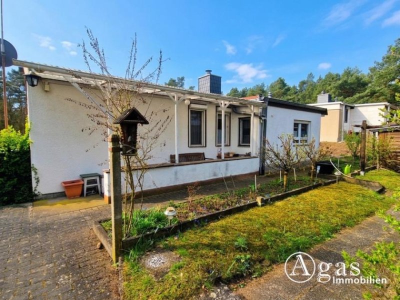 Groß Lindow Erholung pur: Freizeitbungalow mit Holzblockhaus in Bungalowsiedlung und Kanalblick Haus kaufen
