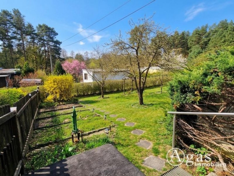 Groß Lindow Erholung pur: Freizeitbungalow mit Holzblockhaus in Bungalowsiedlung und Kanalblick Haus kaufen