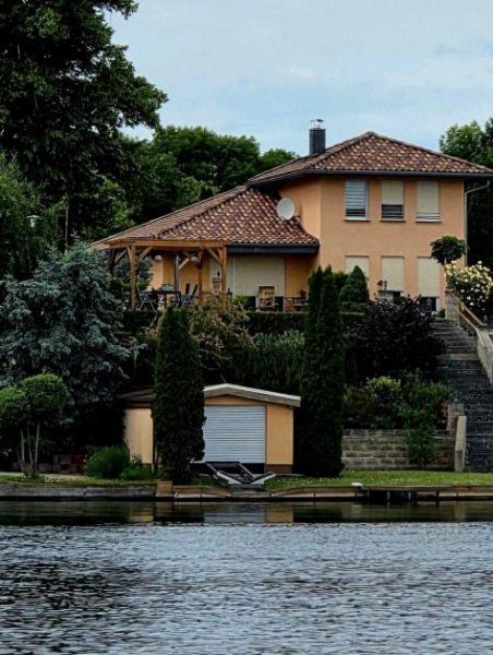 Woltersdorf (Landkreis Oder-Spree) Einzigartiges Wassergrundstück mit Haus und Bootshaus am Kalksee - OHNE MAKLER Haus kaufen