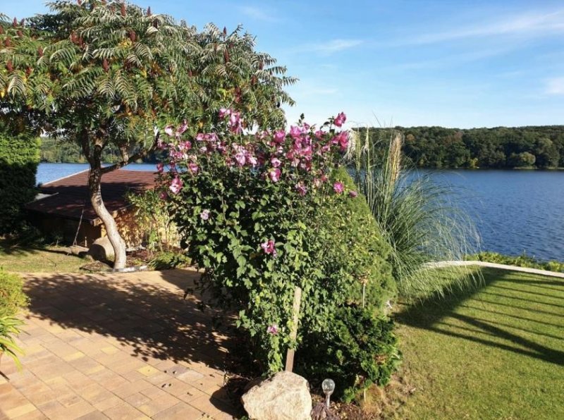 Woltersdorf (Landkreis Oder-Spree) Einzigartiges Wassergrundstück mit Haus und Bootshaus am Kalksee - OHNE MAKLER Haus kaufen