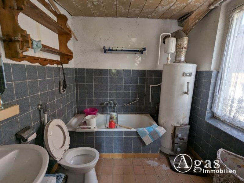 Biesenthal Schmuckstück im Dornröschenschlaf: Einfamilienhaus mit Einliegerwohnung + Nebengelass in Biesenthal Haus kaufen