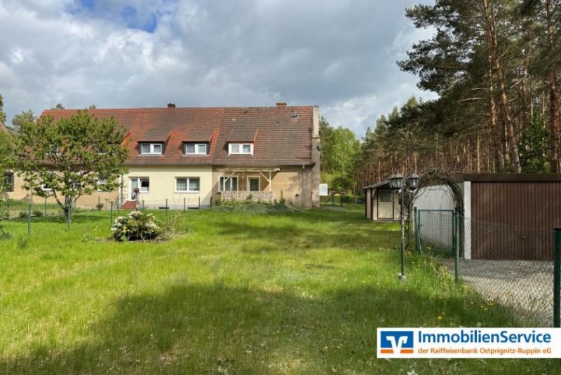Dreetz (Landkreis Ostprignitz-Ruppin) Wohnen, wo der Wald beginnt – charmantes Reihenendhaus mit Garten Haus kaufen