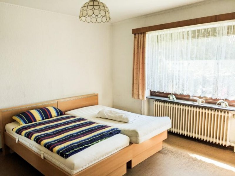 Rellingen Einfamilienhaus mit Ausbaupotential auf großem Grundstück zu verkaufen Haus kaufen
