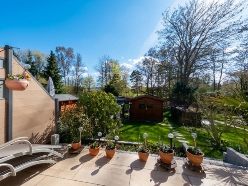 Rellingen Zuhause statt einfach nur Immobilie – gepflegtes Reihenhaus mit idyllischem Garten an der Mühlenau Haus kaufen
