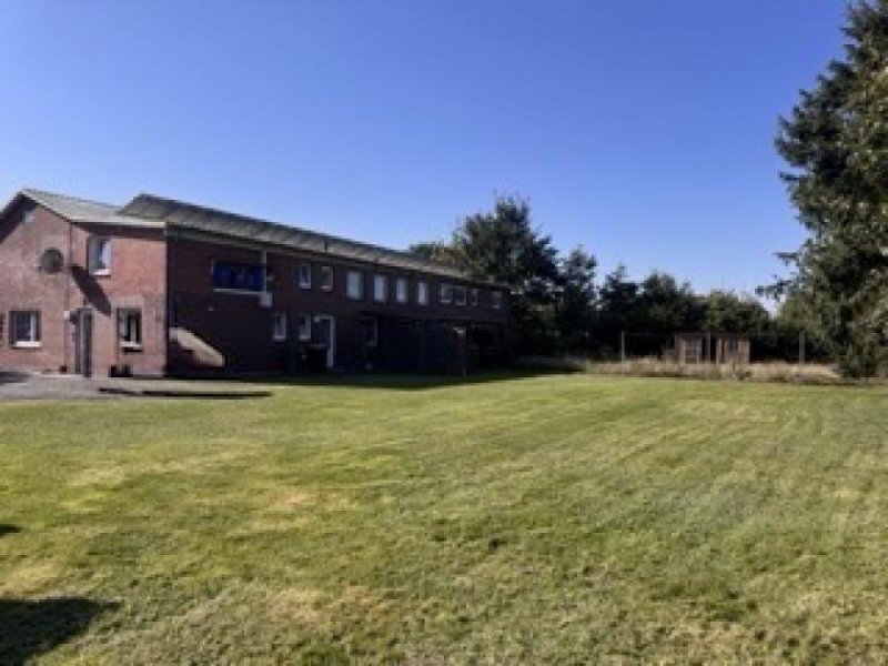 Christianslust 3-Parteien-Haus in St. Michaelisdonn zu verkaufen - Eigenheim & Rendite möglich Haus kaufen