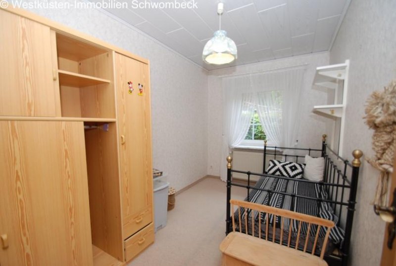 Diekhusen-Fahrstedt Walmdachbungalow in Marne - Stilvolles Wohnen mit Gartenblick und Wintergarten! Haus kaufen