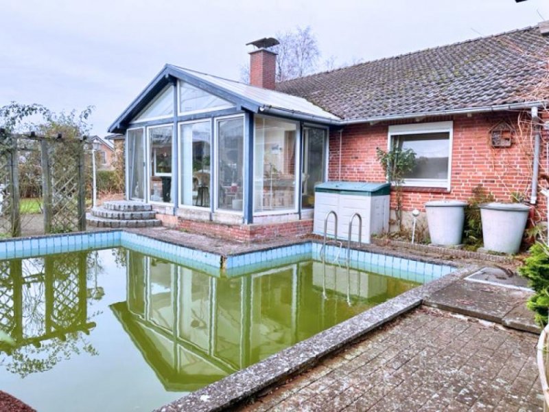 Lohe-Rickelshof Ihr Haus in Lohe-Rickelshof: ebenerdiger Satteldach-Bungalow mit Einliegerwhg. in ruhiger Lage Haus kaufen
