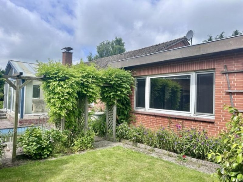 Lohe-Rickelshof Wohnen auf einer Ebene in Lohe-Rickelshof: Bungalow mit Einliegerwohnung und Wintergarten Haus kaufen