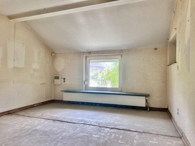 Lohe-Rickelshof Wohnen auf einer Ebene in Lohe-Rickelshof: Bungalow mit Einliegerwohnung und Wintergarten Haus kaufen