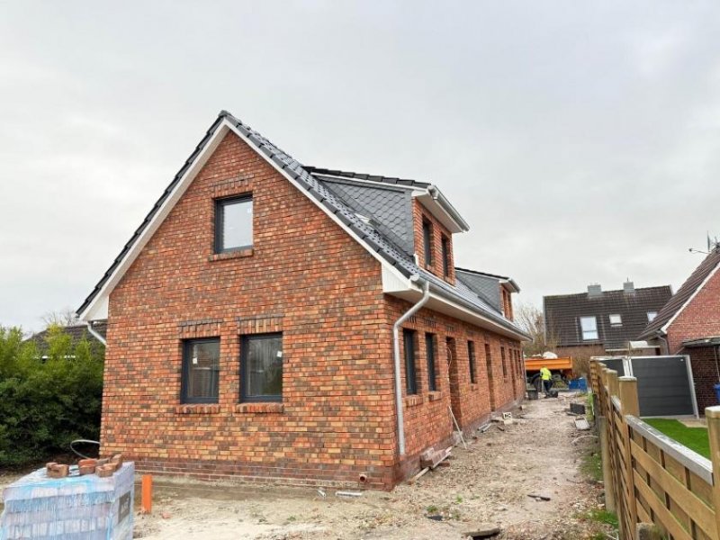 Esens Esens - ruhige Innenstadt-Lage: Neubau Ferienwohnung im Obergeschoss mit Balkon Wohnung kaufen