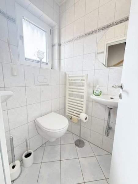Norden Haus mit Einliegerwohnung, EBK, Sommergarten und Garage! Haus kaufen