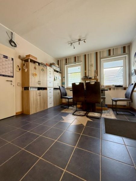 Saterland Großzügiges Einfamilienhaus mit Nebengebäuden und großem Innenhof - Ideal für Familie und Hobby! Haus kaufen