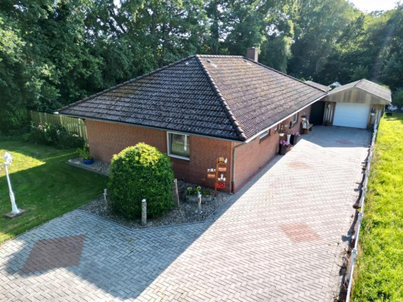 Westoverledingen * Bungalow mit seltenem 1.667 m² Grundstück und wunderschönem Baumbestand * Haus kaufen