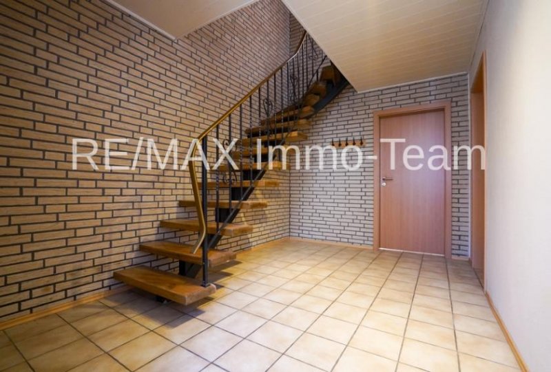 Rhauderfehn Kapitalanlage mit Potenzial: Dreiparteienhaus in gefragter Lage von Holte! Haus kaufen