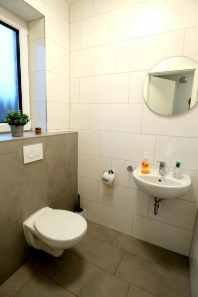 Rhauderfehn Rhauderfehn * 4 Reihenhäuser * Bj. 2022 * Wärmepumpe * jeweils 4ZKB * z.Z. vermietet * möbliert * Haus kaufen