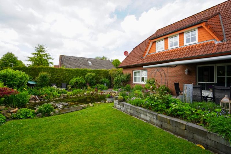 Bunde Gepflegtes Einfamilienhaus mit parkähnlichem Garten in bester Lage von Bunde! Haus kaufen