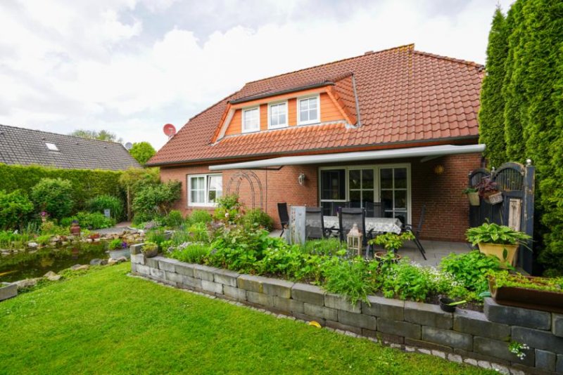 Bunde Gepflegtes Einfamilienhaus mit parkähnlichem Garten in bester Lage von Bunde! Haus kaufen