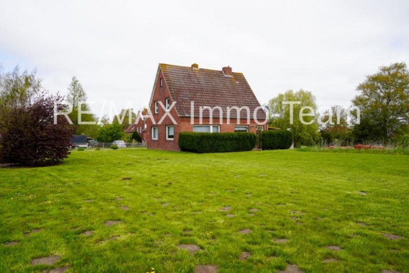 Bunde Sehr gepflegtes Einfamilienhaus mit großem Grundstück, Kamin & unverbaubarem Blick ins Grüne! Haus kaufen