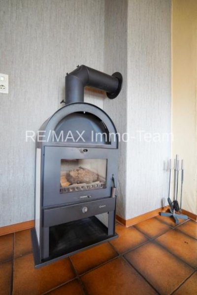 Bunde Sehr gepflegtes Einfamilienhaus mit großem Grundstück, Kamin & unverbaubarem Blick ins Grüne! Haus kaufen