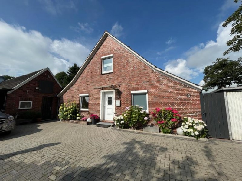 Jemgum Kreatives Wohnen: Charmantes Einfamilienhaus mit Atelier, Werkstatt und angenehmer Atmosphäre in Jemgum Haus kaufen