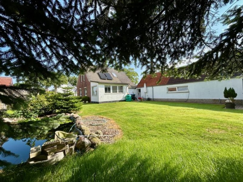 Jemgum Kreatives Wohnen: Charmantes Einfamilienhaus mit Atelier, Werkstatt und angenehmer Atmosphäre in Jemgum Haus kaufen