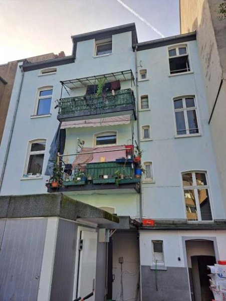Düsseldorf KAPITALANLAGE*** Vermietetes MFH mit vier Wohnungen + Gewerbeeinheit im EG - teilsaniert - gute Lage Haus kaufen