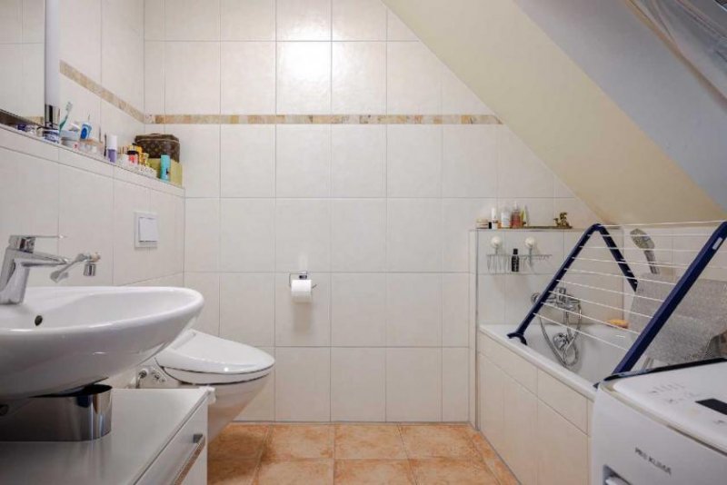 Ratingen 4-Zimmer-Maisonette-Wohnung mit Balkon, Aufzug und TG-Stellplatz in Ratingen-Mitte Wohnung kaufen