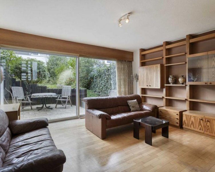 Ratingen Charmantes Reihenhaus mit sonnigem Garten und einer Garage in Ratingen-Mitte Haus kaufen