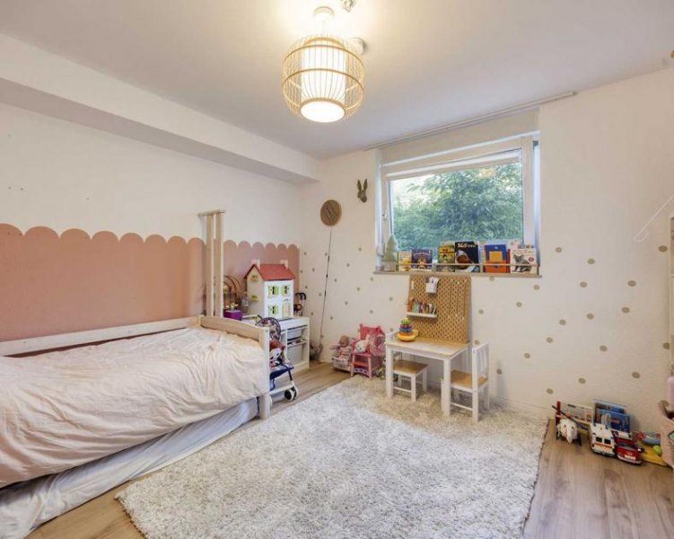 Ratingen Moderne 4-Zimmer-Maisonettewohnung mit Garten und Tiefgaragenstellplatz in Ratingen-Mitte Wohnung kaufen