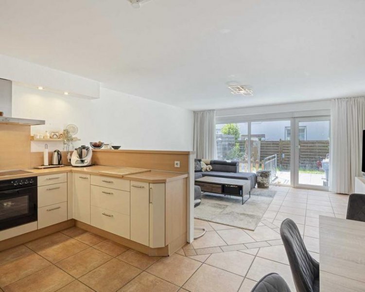 Ratingen Moderne 4-Zimmer-Maisonettewohnung mit Garten und Tiefgaragenstellplatz in Ratingen-Mitte Wohnung kaufen