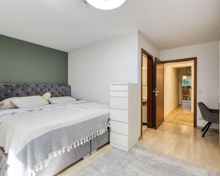 Ratingen Moderne 4-Zimmer-Maisonettewohnung mit Garten und Tiefgaragenstellplatz in Ratingen-Mitte Wohnung kaufen