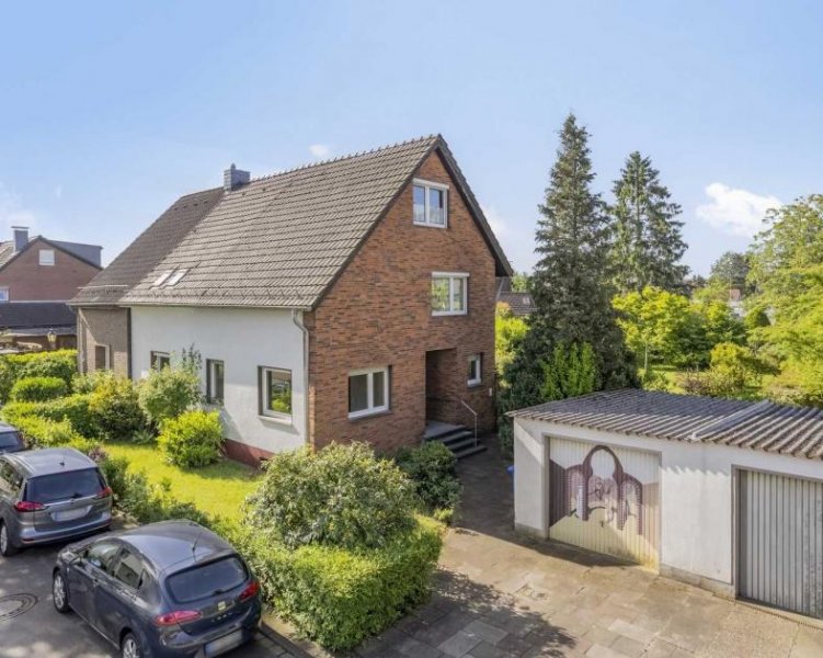 Ratingen Doppelhaushälfte auf traumhaftem Grundstück in Ratingen-Tiefenbroich Haus kaufen