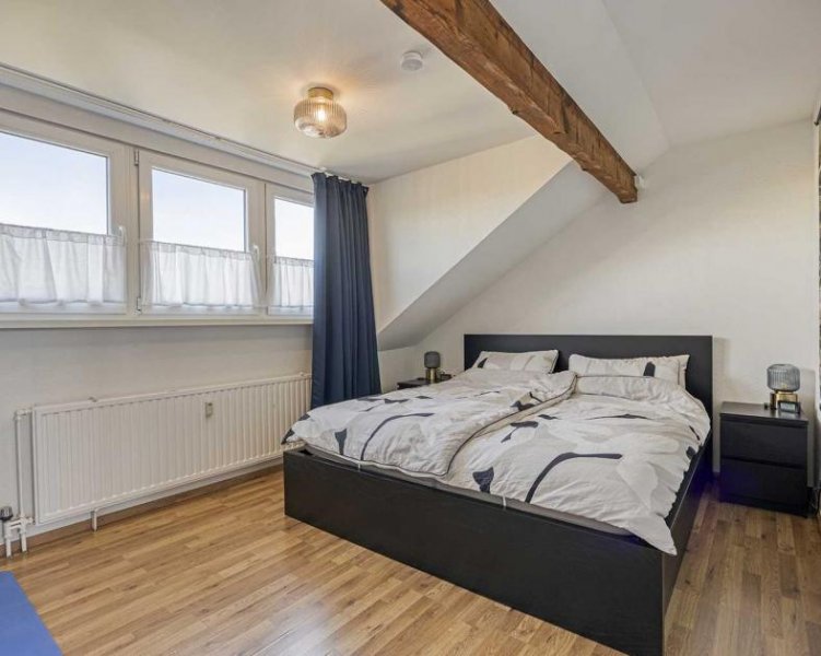 Ratingen Lichtdurchflutete 3-Zimmer-Dachgeschosswohnung mit Stellplatz in Ratingen-Ost Wohnung kaufen