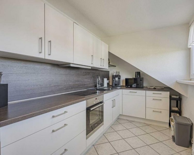 Ratingen Lichtdurchflutete 3-Zimmer-Dachgeschosswohnung mit Stellplatz in Ratingen-Ost Wohnung kaufen