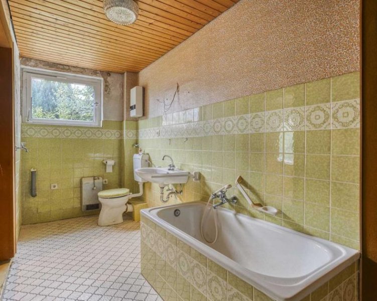 Ratingen Sanierungsbedürftiges Einfamilienhaus in bester Lage von Ratingen-Ost Haus kaufen