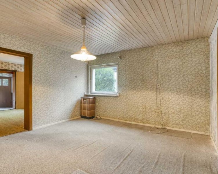 Ratingen Sanierungsbedürftiges Einfamilienhaus in bester Lage von Ratingen-Ost Haus kaufen