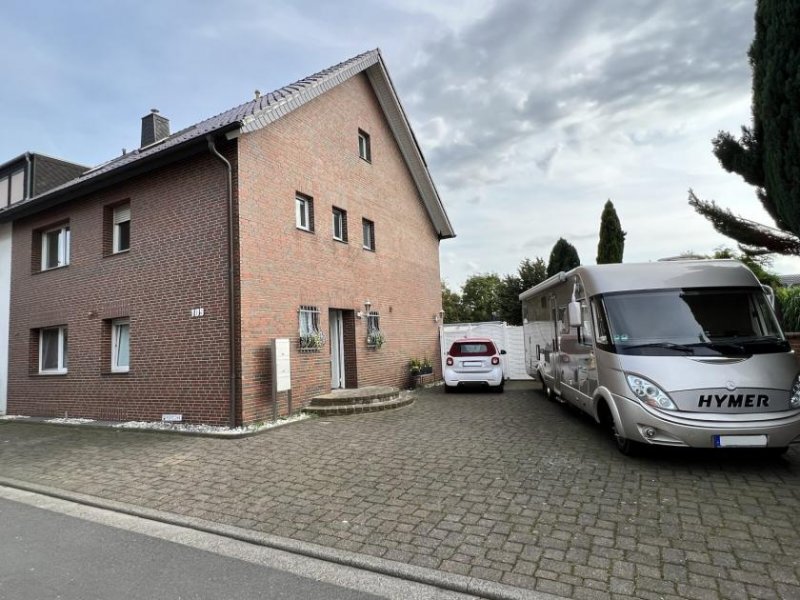 Jüchen Exklusives Mehrfamilienhaus mit großem Grundstück in Jüchen Haus kaufen