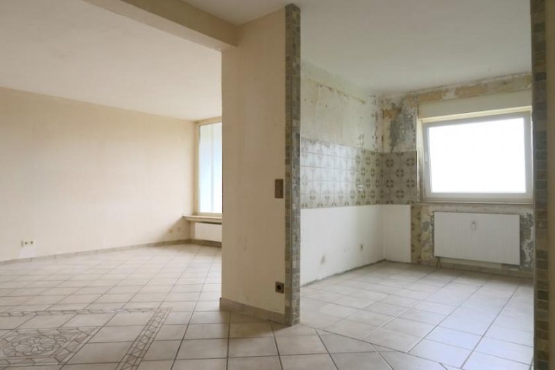 Wülfrath 3 ½ Zimmer Maisonettewohnung mit 2 Balkonen, Gäste WC, Aufzug und Tiefgaragenstellplatz Wohnung kaufen