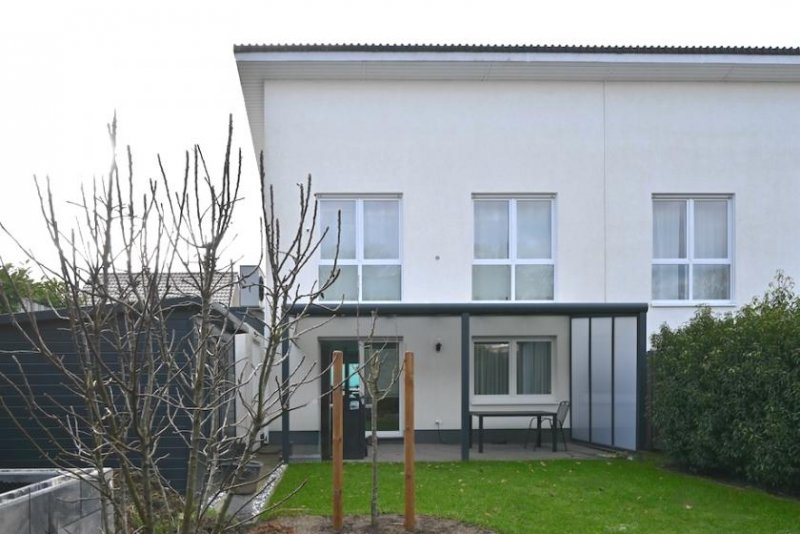 Wülfrath Hundertwassersiedlung am Flehenberg - Junge Doppelhaushälfte mit Fußbodenheizung, Wärmepumpe und PV-Anlage Haus kaufen