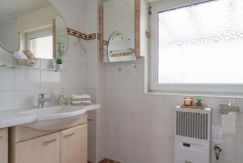 Wülfrath Mehrfamilienhaus mit schönem Garten in Wülfrath-Zentrum: Kombination Eigennutzung/Kapitalanlage Haus kaufen