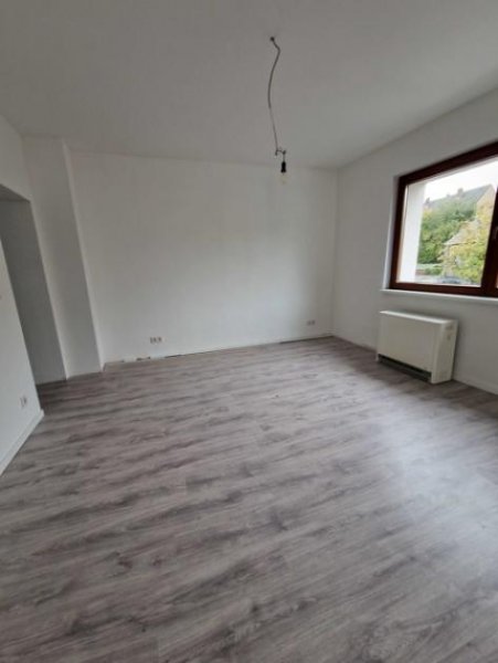Mülheim an der Ruhr Kapitalanlage in Mülheim -Zwei sanierte Mehrfamilienhäuser mit 7 Wohneinheiten/
2 Garagen 2 Carports Haus kaufen