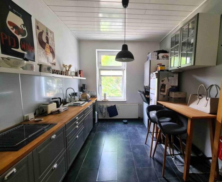 Oberhausen Top gepflegtes Mehrfamilienhaus mit 6 Wohneinheiten - Ladenlokal & Garagenhof in Oberhausen-Styrum Haus kaufen