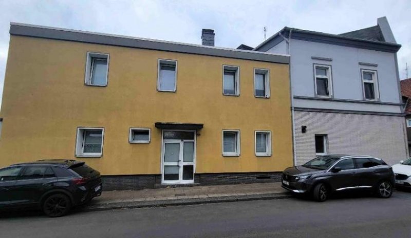 Oberhausen Top gepflegtes Mehrfamilienhaus mit 6 Wohneinheiten - Ladenlokal & Garagenhof in Oberhausen-Styrum Haus kaufen