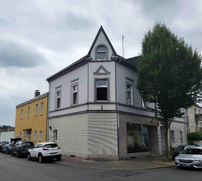 Oberhausen Top gepflegtes Mehrfamilienhaus mit 6 Wohneinheiten - Ladenlokal & Garagenhof in Oberhausen-Styrum Gewerbe kaufen