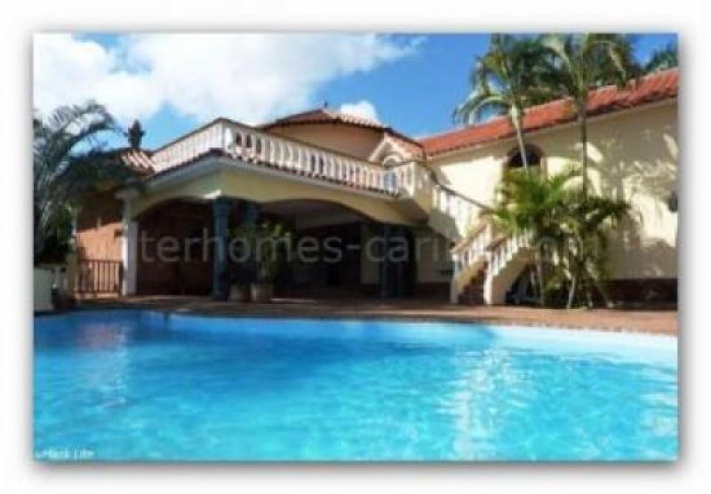 Sosúa/Dominikanische Republik Sosua: Villa mit 215 qm (2300 sqft)Wohnfläche, drei Schlafzimmer, vier Bäder mit Pool in privater Wohnanlage mit Meerblick. 